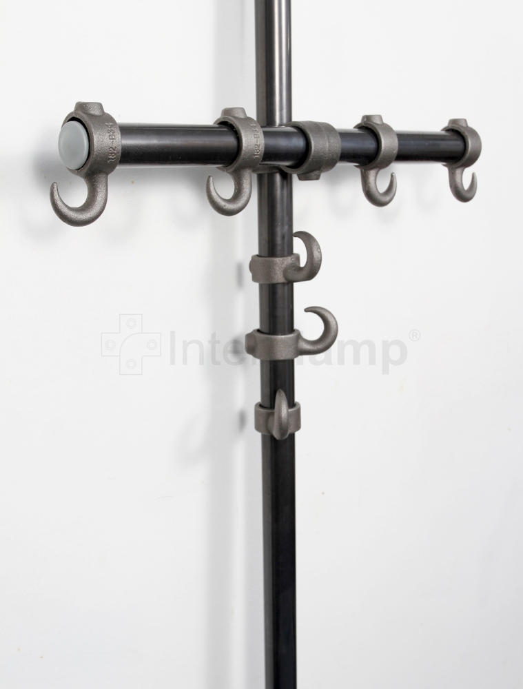 Universal home coat stand with an integrated seat made from Interclamp key clamp fittings and tube, showcasing its practical and elegant design.